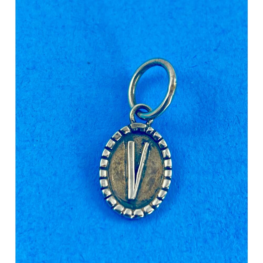 Waxing Poetic Imprinted Oval charm